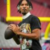 Jayden Daniels Warming Up In Doug Williams Dreamathon T-Shirt